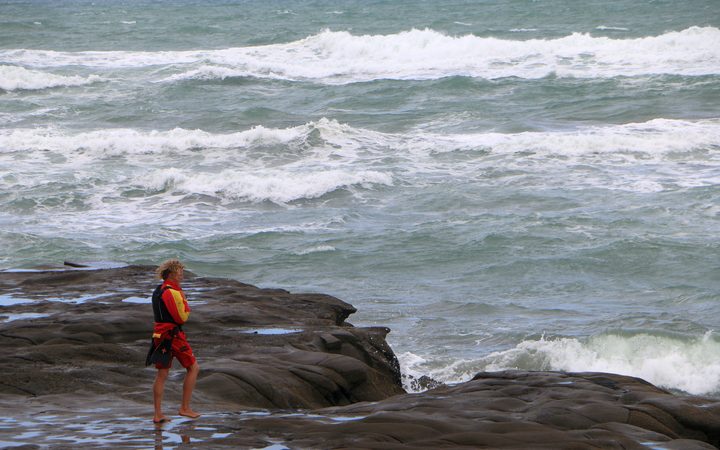 A lifesaver on Muriwai's flat rock.