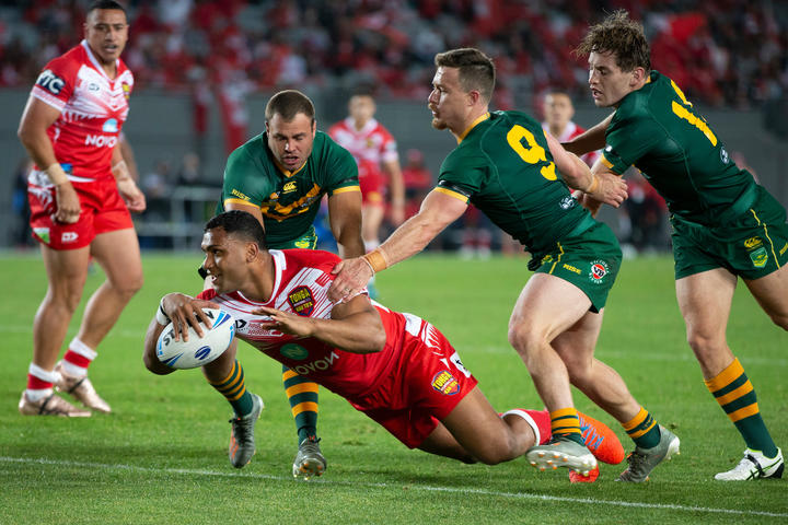 Tevita Pangai scores a try during the rugby league match between the Australian Kangaroos and Tonga Invitational XIII.