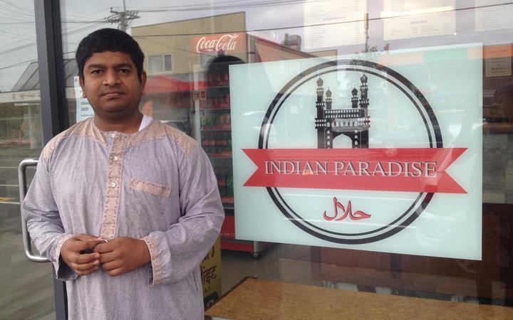 Mohammad Khaja Mohiuddin outside his new takeaway store, Indian Paradise.
