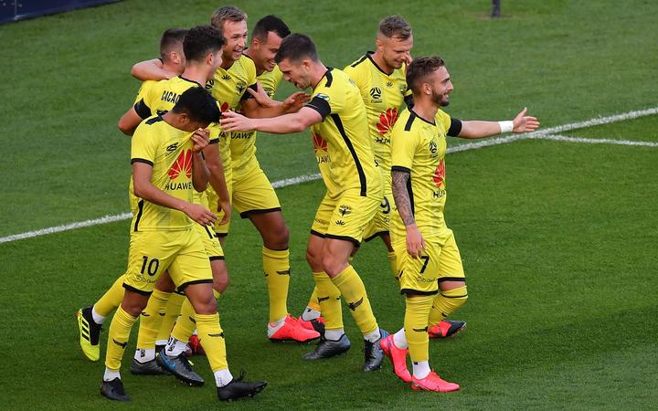 The Phoenix celebrate a goal. 