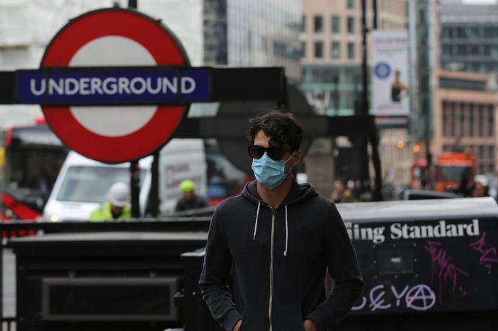 A person wears medical mask as a precaution against coronavirus (COVID-19) in London, United Kingdom on March 18, 2020. 