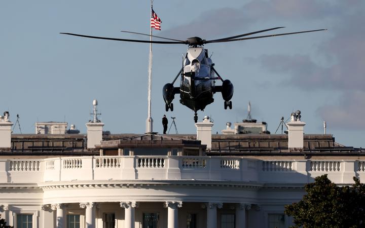 WASHINGTON, DC - OCTOBER 02: Marine One, the presidential helicopter, arrives at the White House to carry U.S. President Donald Trump to Walter Reed National Military Medical Center October 2, 2020 in Washington, DC. 