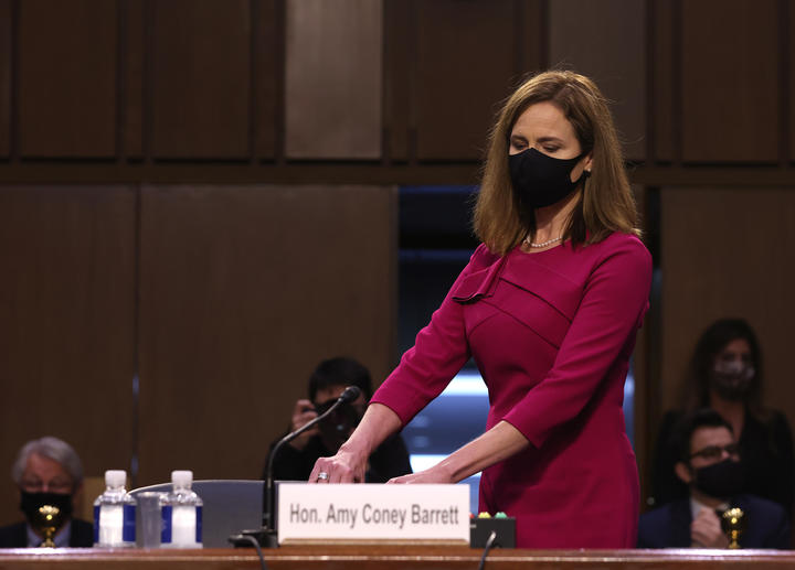 Supreme Court nominee Judge Amy Coney Barrett takes her seat after a break in the Senate Judiciary Committee confirmation hearing on Capitol Hill on October 12, 2020 in Washington, DC. 