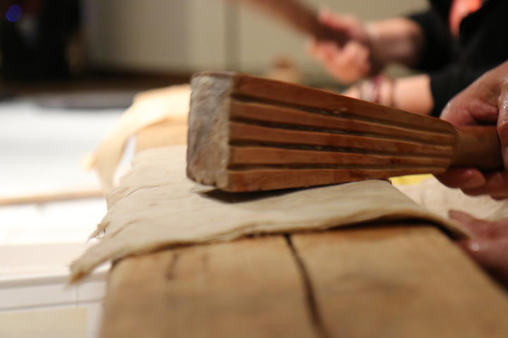 Pounding the hiapo (mulberry tree) bark one of the first stages of making ngatu.