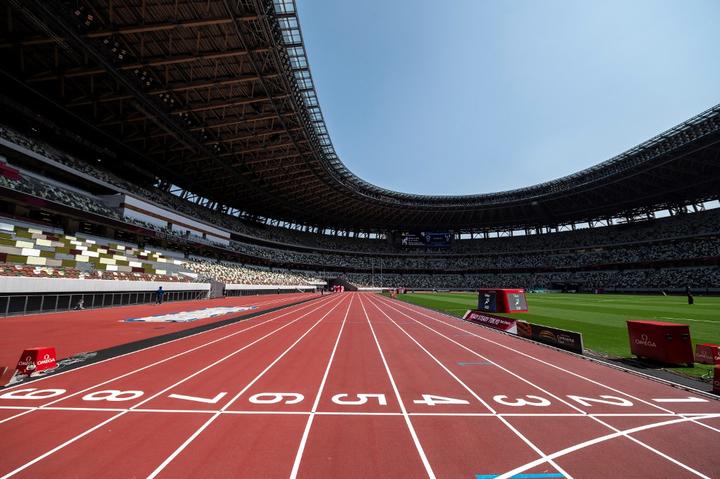 A general view shows the National Stadium, main venue for the Tokyo 2020 Olympic and Paralympic Games, in Tokyo on May 9, 2021. (Photo by Charly TRIBALLEAU / AFP)