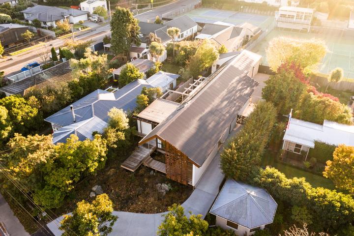 The house was built by Ben Brady of Linetype Architectural and is set on a long, narrow site with a high ground water level.