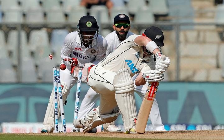 Henry Nicholls of New Zealand bowled out by R Ashwin of India during day two of the 2nd test match between India and New Zealand held at the Wankhede Stadium in Mumbai on the 4th December 2021.