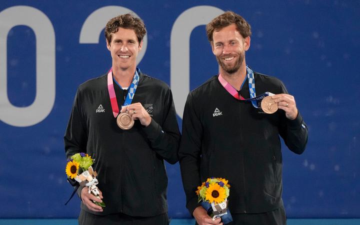 New Zealand's Michael Venus and Marcus Daniell (right) with their Olympic bronze medals in Tokyo.

