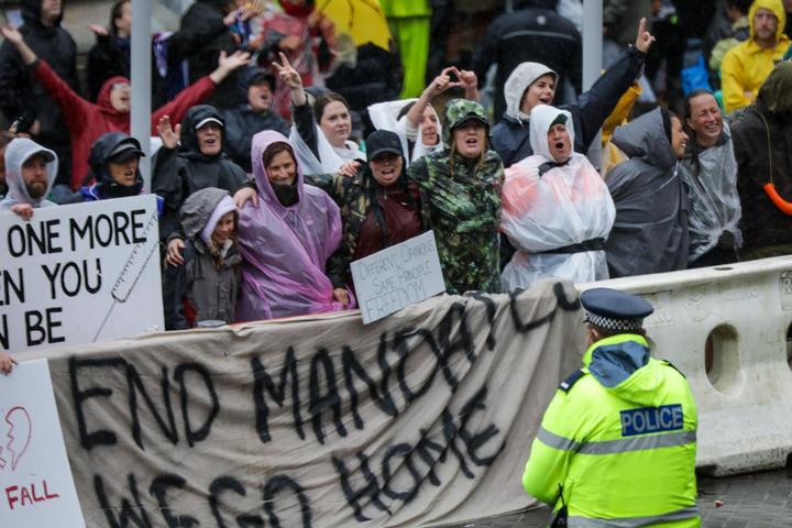 Protesters outside Parliament sing along to James Blunt's 'You're Beautiful', on 13 February, 2022.