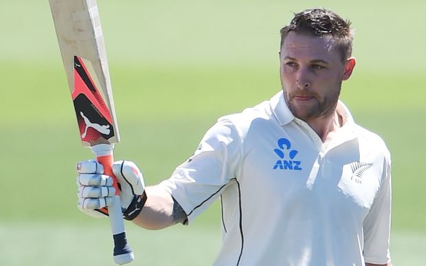 Brendon McCullum celebrates a world record test century.