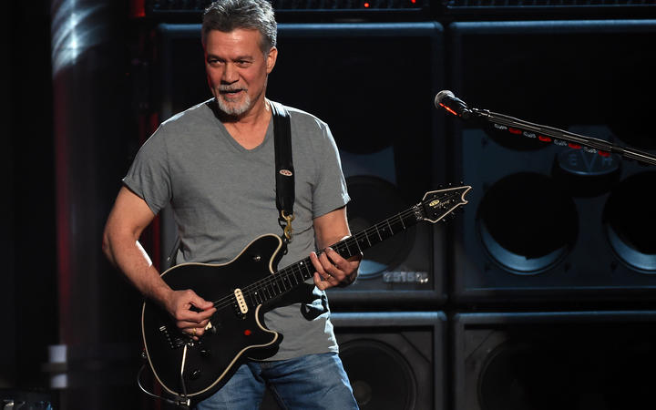 Eddie Van Halen of Van Halen performs onstage during the 2015 Billboard Music Awards.