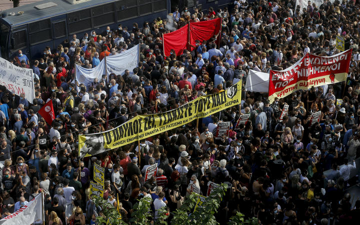 Thousands outside the Athens appeal court cheered as the leadership of the far-right Golden Dawn party was found guilty of running a crime group.