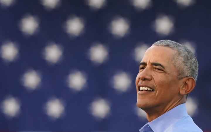 Former US President Barack Obama addresses Biden-Harris supporters during a drive-in rally in Philadelphia, Pennsylvania on October 21, 2020. - 