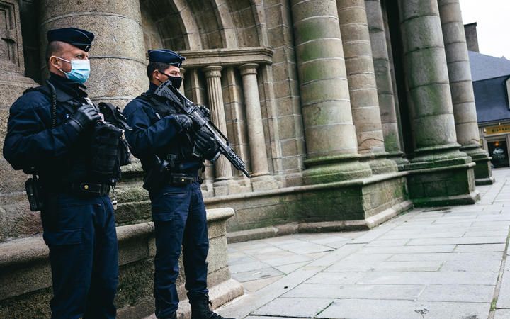 Members of the police force monitor a place of worship after the two attacks in Nice and Avignon and the disconnection of the red level from the vigipirate plan. 