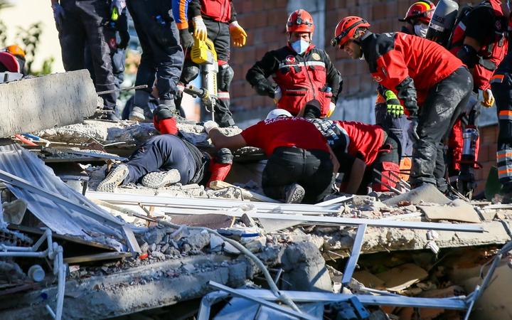 IZMIR, TURKEY - OCTOBER 31: Search and rescue works continue at rubbles of a collapsed building after a magnitude 6.6 quake shook Turkey's Aegean Sea coast, in Izmir, Turkey on October 31, 2020.