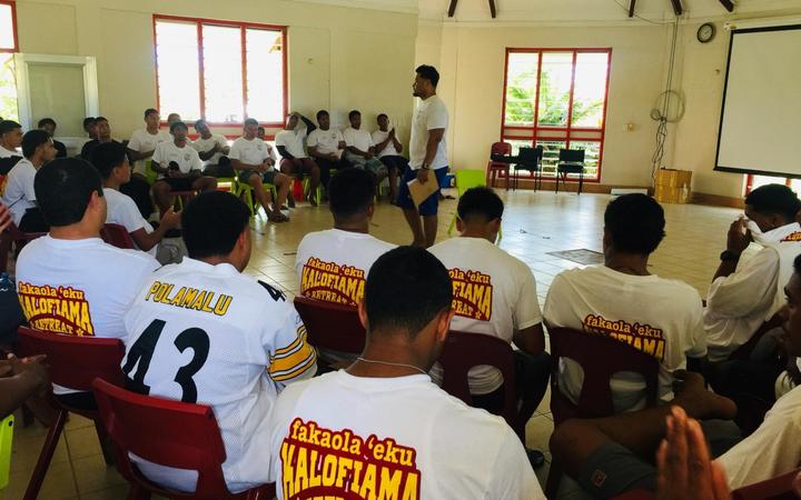 Tongan high school students listen to a presentation during a three day camp aimed at ending inter-school violence.