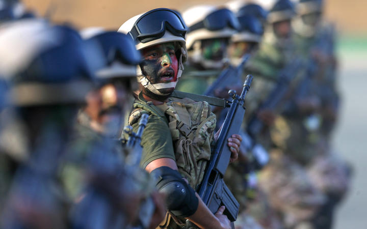 File photo: Saudi armed forces march during a parade in Saudi Arabia's holy city of Mecca on August 13, 2018, ahead of the annual Hajj pilgrimage. 