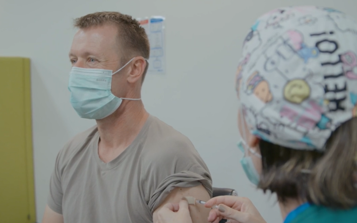 Managed Isolation and Quarantine (MIQ) head Brigadier Jim Bliss getting his second vaccine.