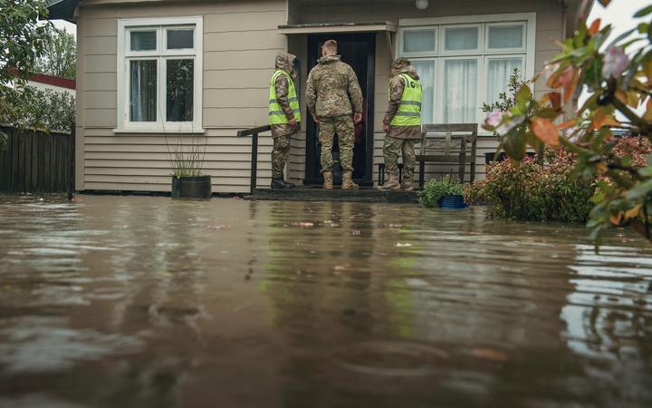 Defence Force staff check in on people.