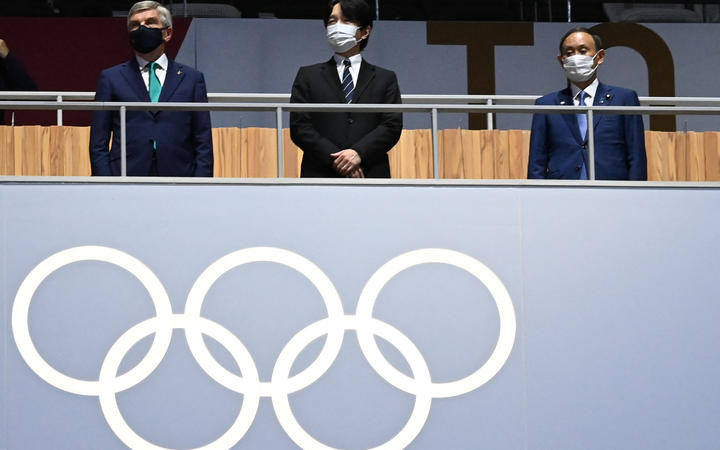 Japan's Prime Minister Yoshihide Suga , Japan's Emperor Naruhito, President of the International Olympic Committee (IOC) Thomas Bach during the closing ceremony of the Tokyo 2020 Olympic Games, at the Olympic Stadium, in Tokyo