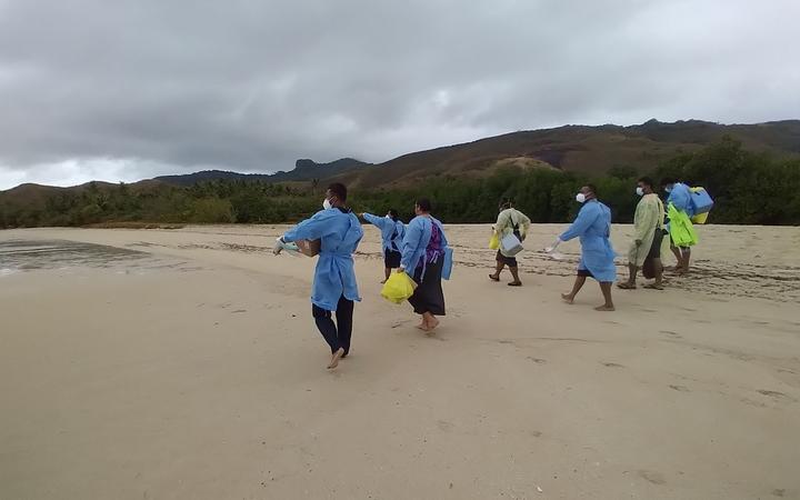 Front-line workers on their way to swab villagers in remote Fiji. 
