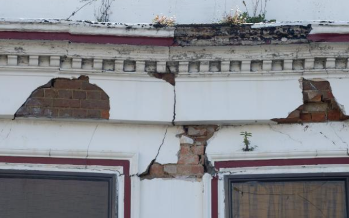 Wooden scaffolding in place after cracks were discovered in a building in central Dunedin