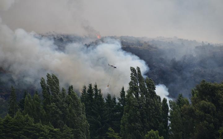 The blaze has ripped through 200 hectares of regenerating bush at Emerald Bay.
