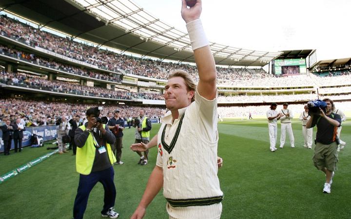 In this file photograph taken on December 28, 2006, Australian spinner Shane Warne waves to the crowd after playing his last Test Match on his home ground, the MCG, on the third day of the fourth cricket Test played in Melbourne.