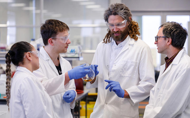 Rua Bioscience co-founder Panapa Ehau with cannabinoid researchers at a New Zealand university.