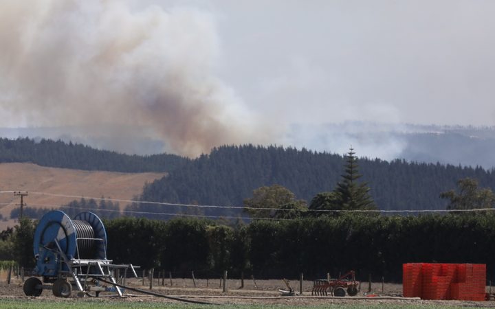 Clouds of smoke are seen rising from the bush fire area at Pigeon Valley this afternoon. 