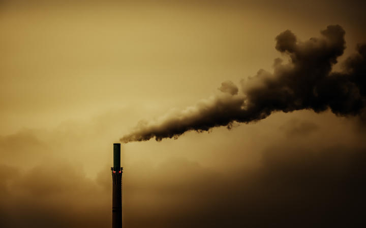 Industrial air pollution smoke chimney.