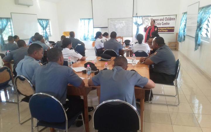 'Ofa-ki-Levuka Guttenbeil Likiliki (addressing the group) conducts a training for new Police recruits in Tonga on gender, human rights and ending violence against women. October 2019