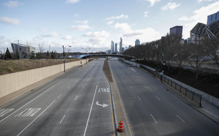 Columbus Drive is seen empty in downtown Chicago, Illinois, on March 21, 2020.