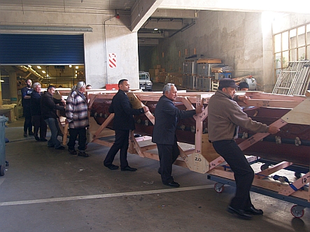 Moving the waka to be lifted onto the haulage truck.