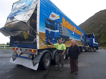 Curator of Wairarapa Moana Haami Te Whaiti (right) and the Waka Te Heke Rangatira being shipped from Te Papa to Aratoi Museum.