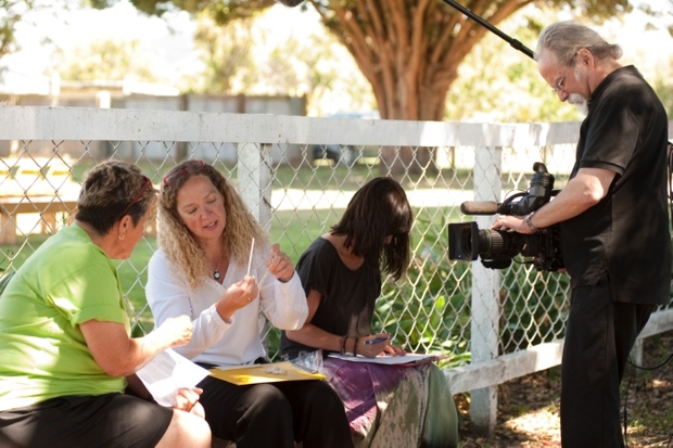 Lisa Matisoo Smith taking DNA samples