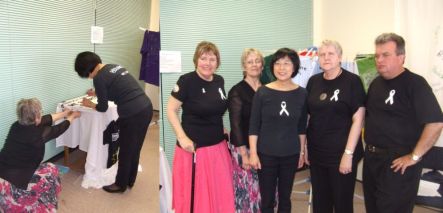 Minister of Womens Affairs Pansy Wong signs her support and the Disability Clothesline project launch team