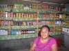 Example of microfinance, Samoan woman in her shop