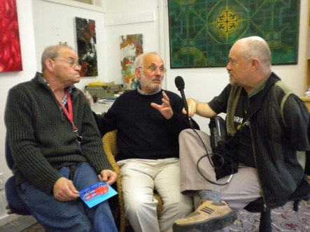 Mike Gourley interviews art student Darryl Kennedy (left) with the help of support person George Waterson.