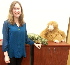 Elaine Reese with stuffed toys in the lab