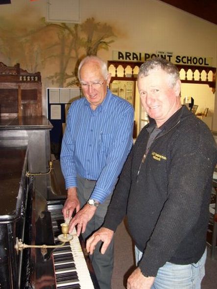 Albertlanders Peter Marsh L Steve Levet with the piano that arrived with the first shipload of Albertlanders