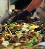 Green-lipped mussels being sorted on a processing line