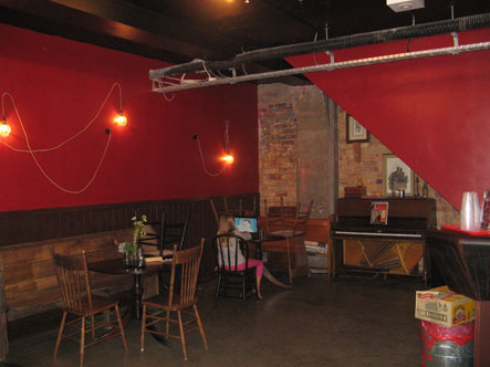 foyer performance space with new red paint job