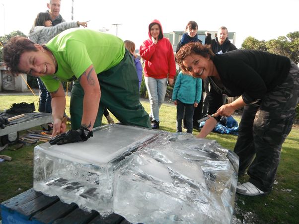 Carrie Burke and Jules Hunt ice carving at the Petone Winter Carnival